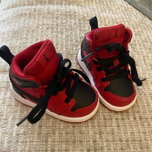 Baby Air Jordan 1. Red and black. Worn 1x and out grown